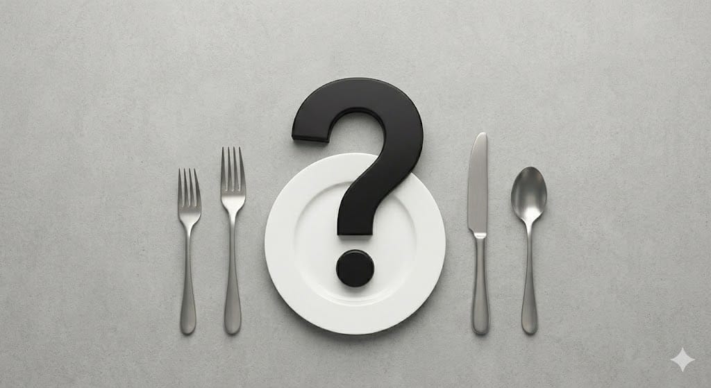 A dinner plate with flatware and a big question mark over the top.