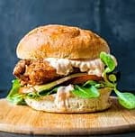 A nice plump burger with sriracha mayo.