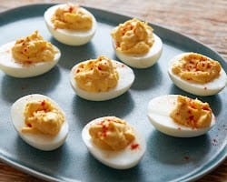 a tray of deviled eggs