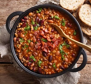 Centennial Beef & Bean Stew in a cast irn pot.