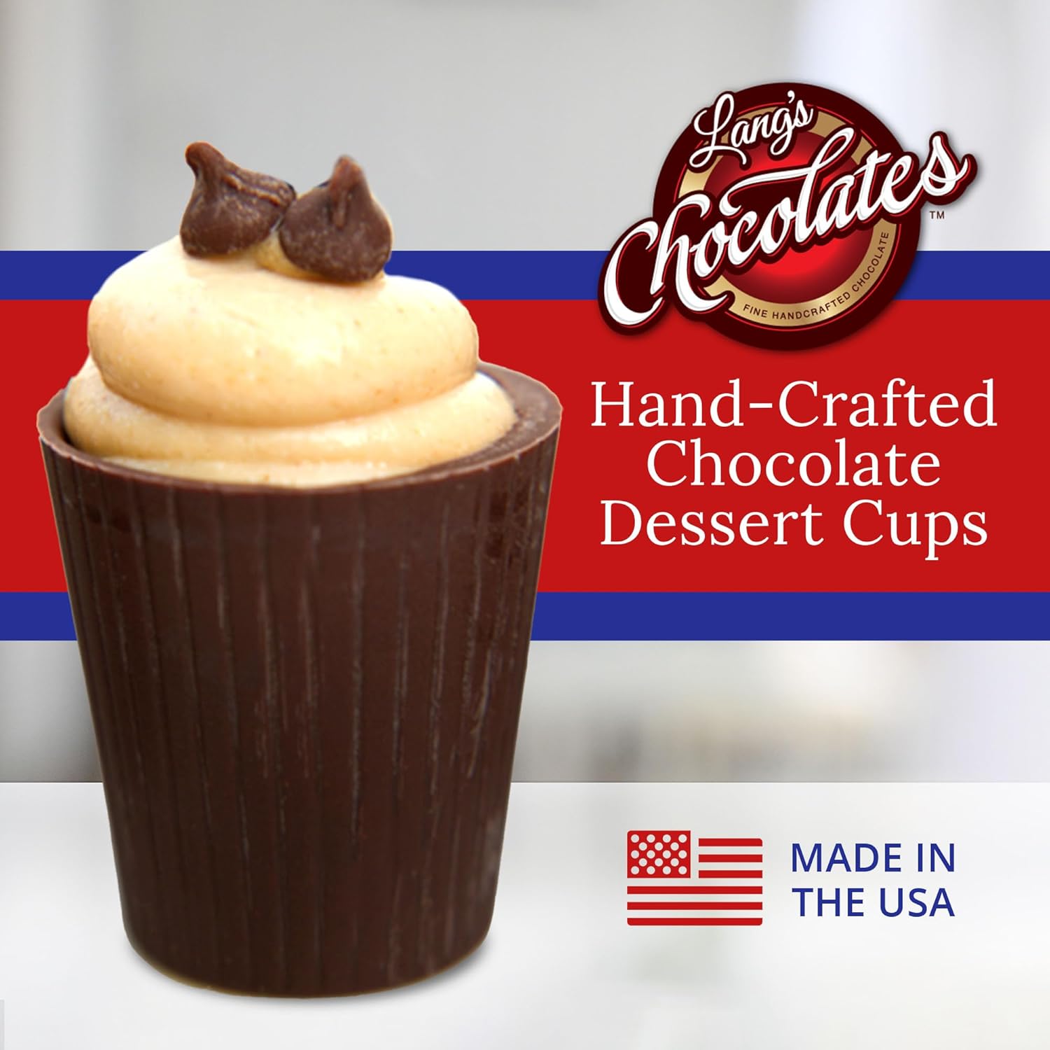 Milk chocolate shot glass filled with a dessert.